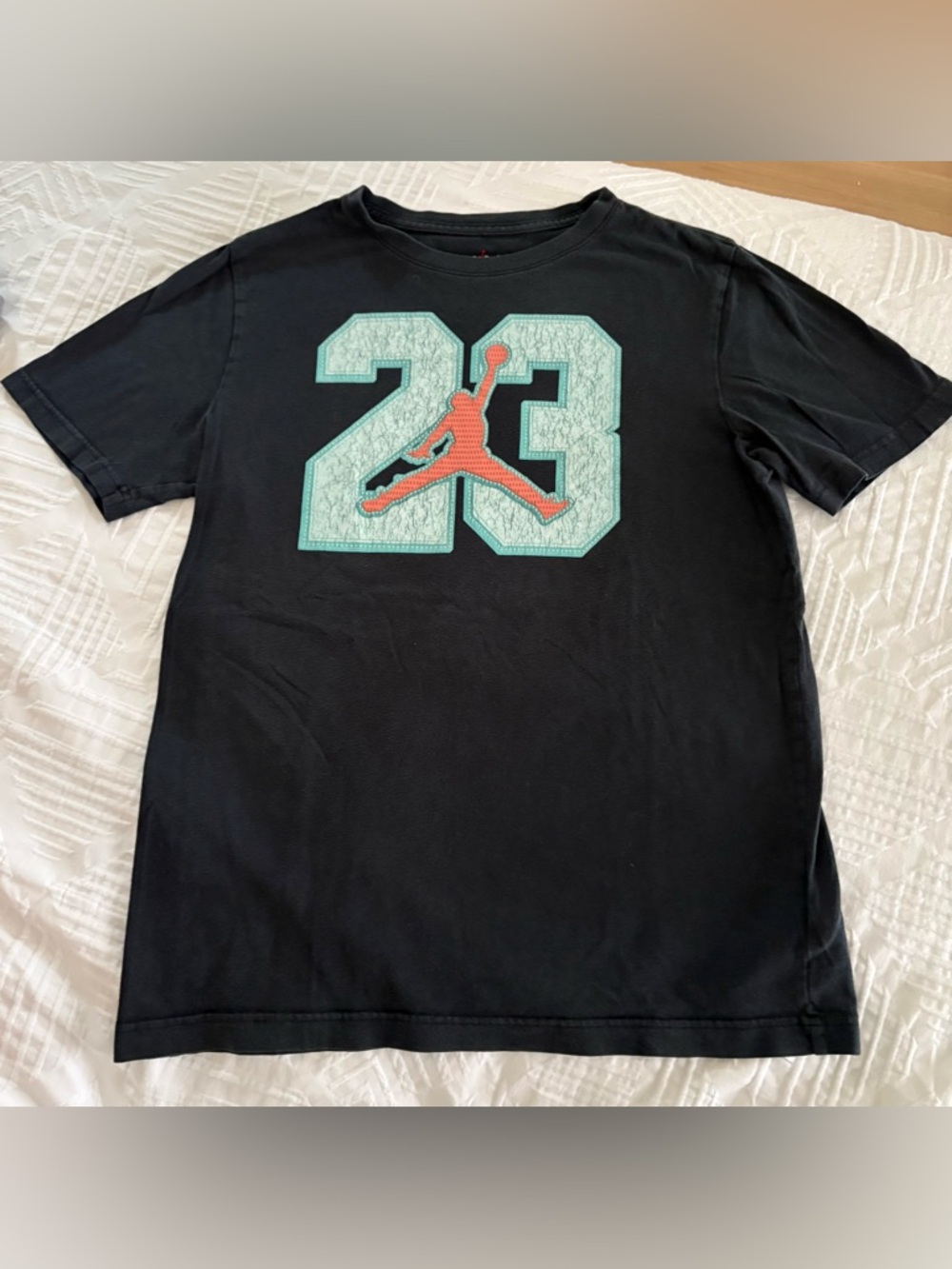 Jordan Black Tee with Aqua 23 and Orange Jordan Jumpman. Youth XL- 13-15